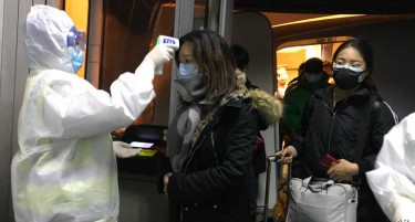Термални монитори низ градот за заштита од коронавирусот - кинескиот град Вухан во изолација