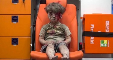 Асад тврди - Сликата од рането дете во амбулантно возило е лажна
